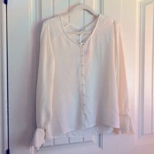 White and silver striped top